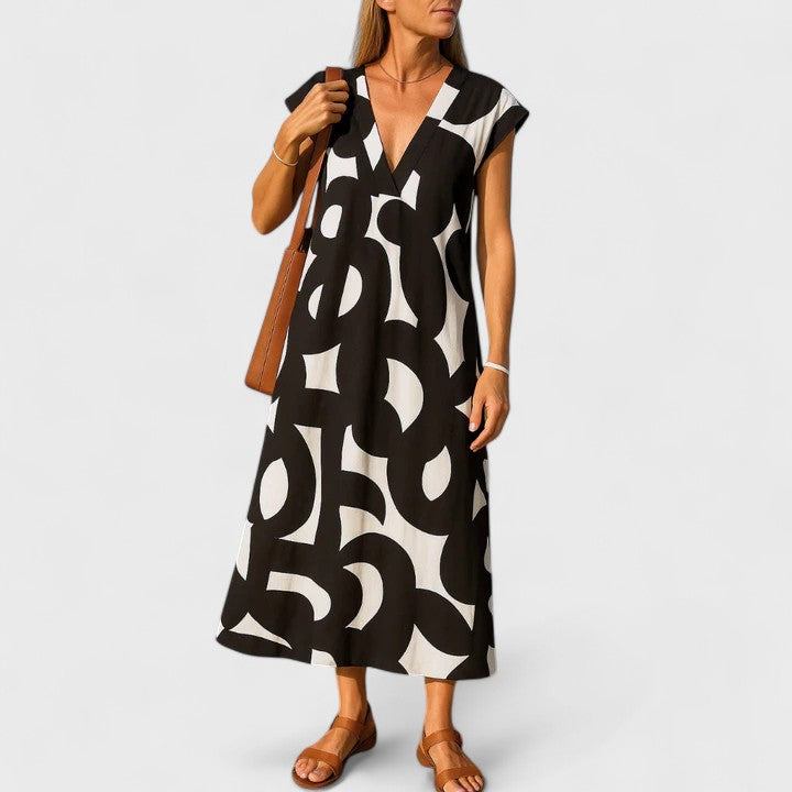 Mevani - Flowing V Neck Dress